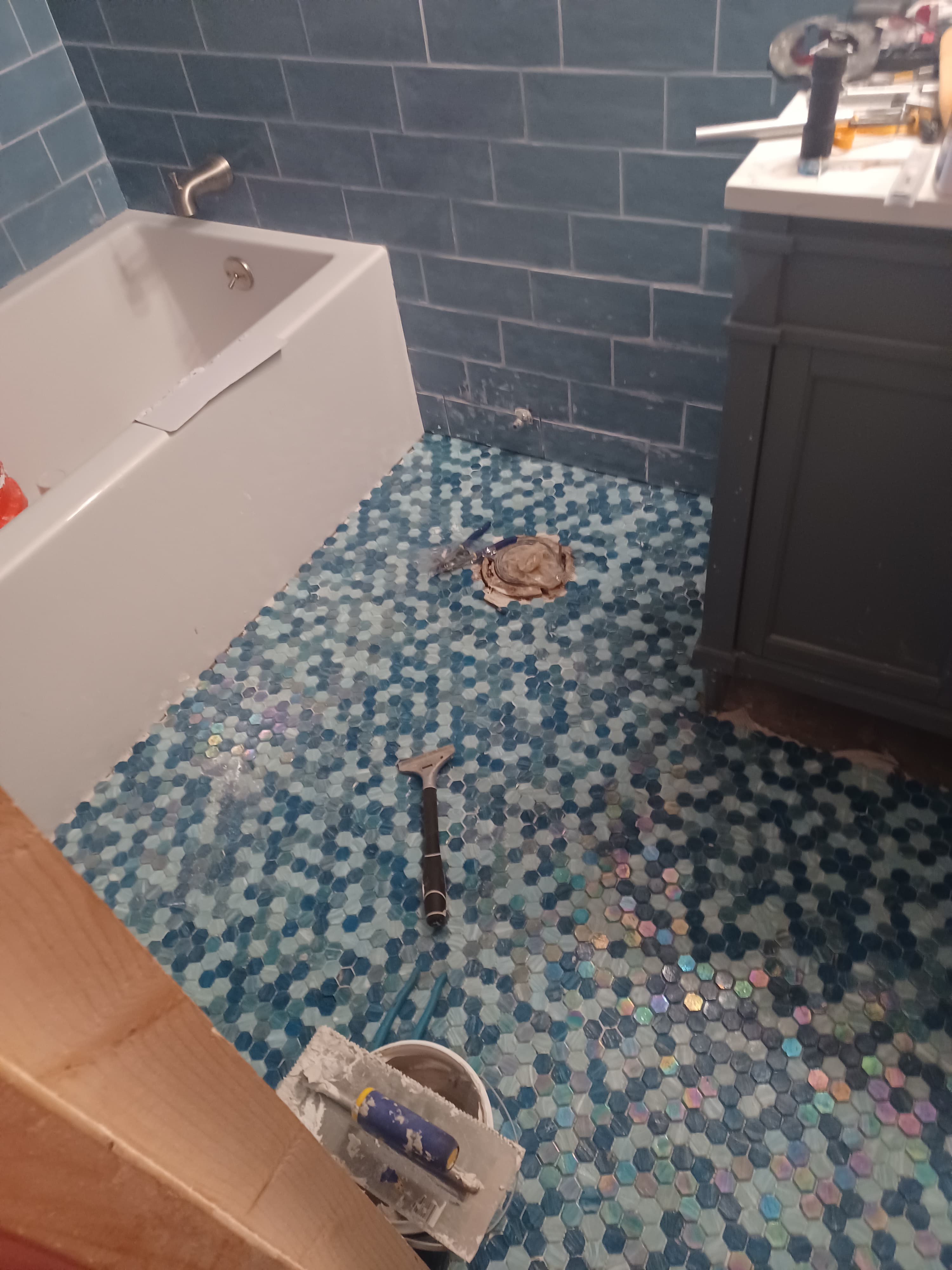 Finished bathroom remodel with updated tiles and vanity